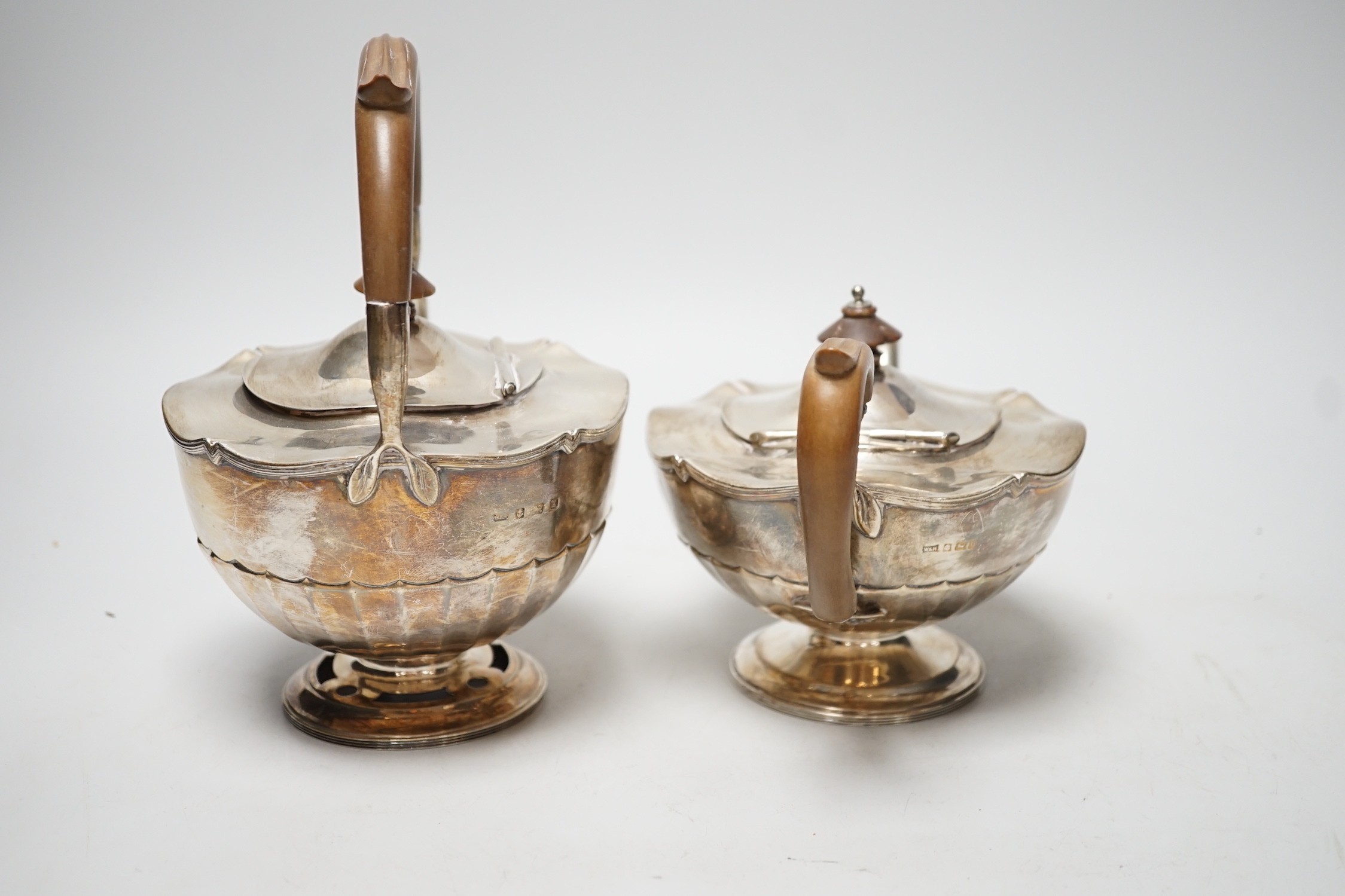A George V silver tea kettle and teapot by Walker & Hall, Birmingham, 1919 & 1922, kettle height 20.5cm, 30.6oz.